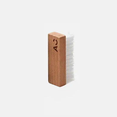 Wooden garment brush with soft bristles for luxury fabric care, eco-friendly clothing maintenance tool