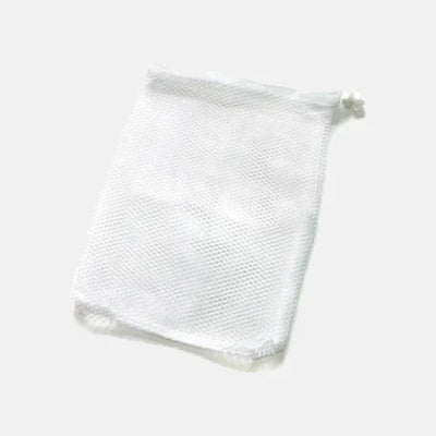 White mesh laundry bag for delicate garment care, ideal for eco-friendly dry cleaning protection