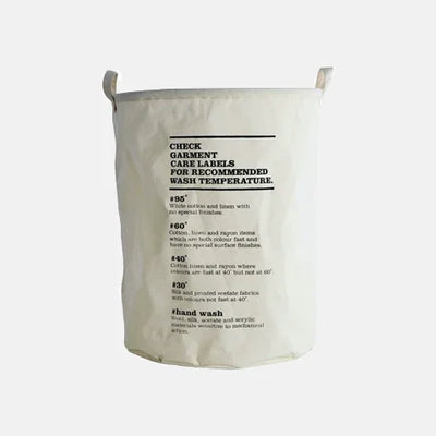 Eco-friendly laundry bag with garment care instructions for wash temperatures, ideal for luxury fabric care