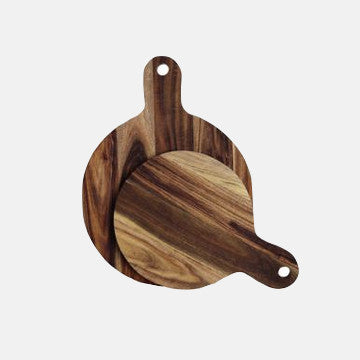 Two wooden cutting boards with natural grain, one round with handle, ideal for kitchen prep and serving