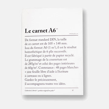 A6 notebook with recycled paper cover, lined pages, and French text description